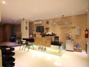 Lobbyn eller receptionsområdet på Griya Jogja Hotel