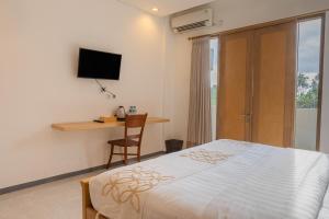 Postel nebo postele na pokoji v ubytování ME Rooms Ubud