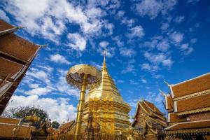 a pagoda with a cross on top of it at The Passion Hotel in Chiang Mai