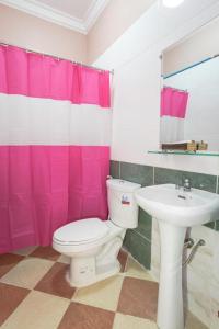 a bathroom with a toilet and a sink at Mekong View Hotel in Phnom Penh +53 photos