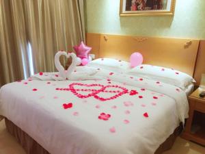 Katil atau katil-katil dalam bilik di The Grace Hotel Shanghai Yexie