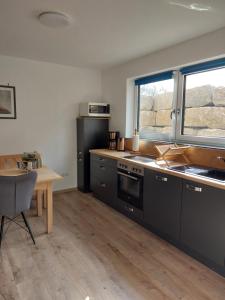 A cozinha ou kitchenette de Ferienwohnung Gartenweg