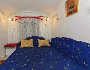 Postel nebo postele na pokoji v ubytování Barokk Vendégház