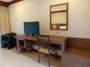 A television and/or entertainment centre at The Impress Nan Hotel