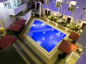 an overhead view of a large swimming pool in a hotel at Isabela Zen Hotel & Restaurant Corporation in Santiago