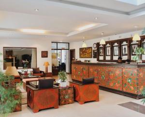 a lobby of a hotel with a reception desk at Khang Residency Thimphu in Thimphu
