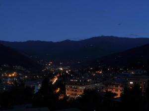 a view of a city at night at Khang Residency Thimphu in Thimphu