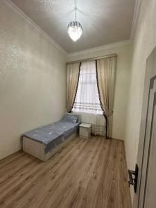 Una cama o camas en una habitación de Хостел Мистер Шох