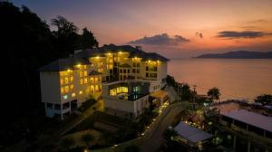 an aerial view of a large building at night at Royal Hill Satun Hotel in Satun