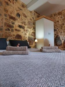 Posezení v ubytování Roza Stone Studio & Suite