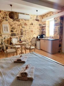 Kuchyň nebo kuchyňský kout v ubytování Roza Stone Studio & Suite