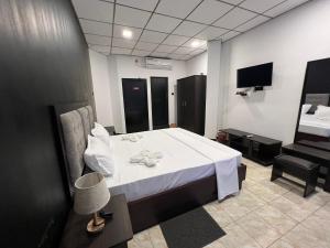 Postel nebo postele na pokoji v ubytování Nilo Lanka Hotel