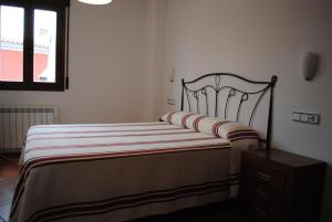 Postel nebo postele na pokoji v ubytování Apartamentos Moravella