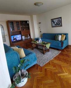 Posezení v ubytování JO.RA. APARTMENT + 32 fotografií