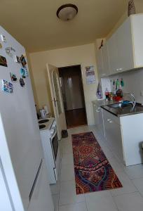 Cucina o angolo cottura di JO.RA. APARTMENT
