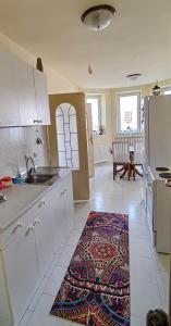 Cucina o angolo cottura di JO.RA. APARTMENT