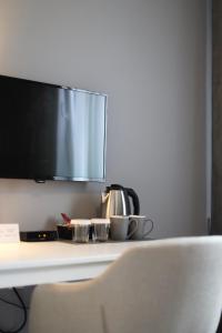 Kuchyň nebo kuchyňský kout v ubytování Rooms Kaktus