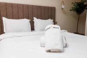 Katil atau katil-katil dalam bilik di Stylish 1BR flat in Hay Riad Central Rabat