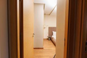Katil atau katil-katil dalam bilik di Stylish 1BR flat in Hay Riad Central Rabat