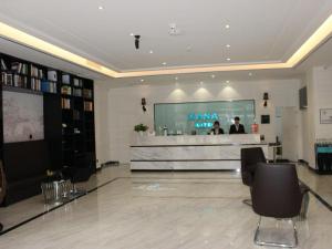 a lobby with a karmaarmaarma counter in a building at Xana Lite Ganzi Luding YanAn Road in Lutingkiao
