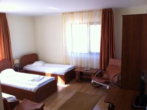 Postel nebo postele na pokoji v ubytování JRB Hotel + 29 fotografií
