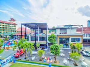 an overhead view of a building with a playground at The Bed Vacation Rajamangala Hotel in Songkhla