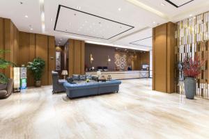 Posezení v ubytování Yitel Shenyang Hunnan Olympic Sports Center Wanda Plaza