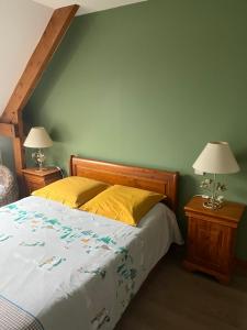 Postel nebo postele na pokoji v ubytování Le Moulin de la Butte