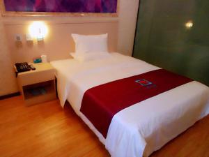 Katil atau katil-katil dalam bilik di PAI Hotels·Urumqi South Gate Xinhua Bookstore