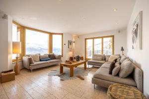 Χώρος καθιστικού στο Chalet Enchanteur