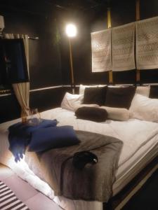 Кровать или кровати в номере G - House