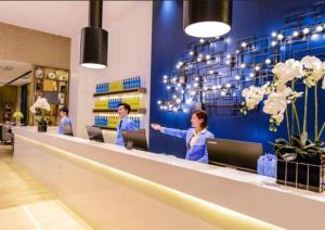 Lobbyen eller receptionen på Echarm Hotel Guiyang Longdongbao International Airport Outlets