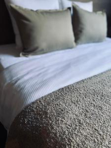Postel nebo postele na pokoji v ubytování HOTEL BORNEM