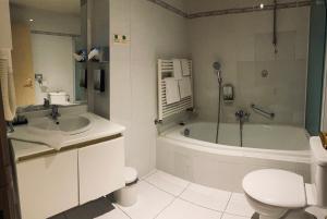 Koupelna v ubytování HOTEL BORNEM