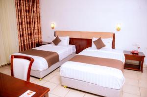 Cama o camas de una habitación en Quiet Haven Hotel
