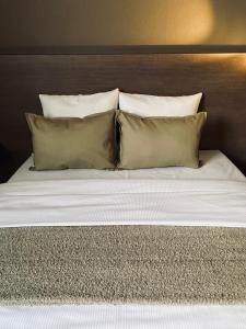 Postel nebo postele na pokoji v ubytování HOTEL BORNEM