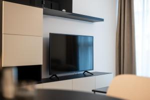 TV a/nebo společenská místnost v ubytování Central View Apartment 1