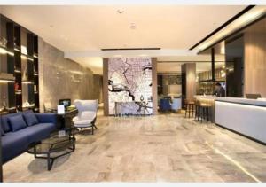 Ο χώρος του λόμπι ή της ρεσεψιόν στο Echarm Hotel Guilin High-tech Wanda Li Lake