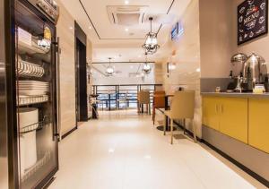 Kjøkken eller kjøkkenkrok på City Comfort Inn Beihai Yintan International Ferry Terminal