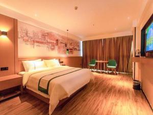 En eller flere senger på et rom på City Comfort Inn Changsha Huanghua Airport Yong'an