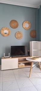 TV a/nebo společenská místnost v ubytování Bungalow Casa de Pablo