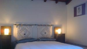 Posteľ alebo postele v izbe v ubytovaní Agriturismo Podere Mulinaccio