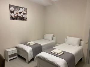 Letto o letti in una camera di Cultural Crossing Hotel