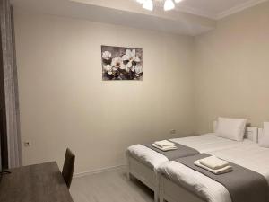 Letto o letti in una camera di Cultural Crossing Hotel