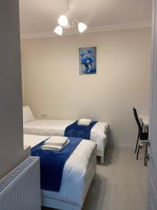 Letto o letti in una camera di Cultural Crossing Hotel