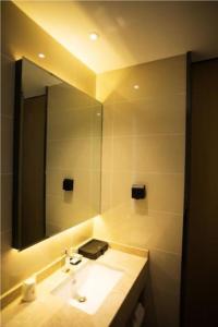 Ванная комната в City Comfort Inn Wuhu City Xingyue Square