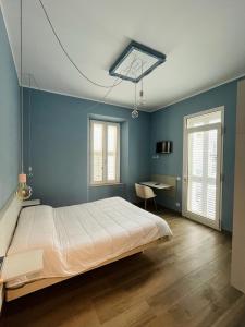 Voodi või voodid majutusasutuse La Maison toas