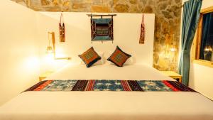 Postel nebo postele na pokoji v ubytování Supan Ecolodge