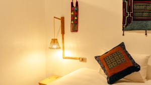 Postel nebo postele na pokoji v ubytování Supan Ecolodge