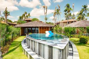 Der Swimmingpool an oder in der Nähe von Ocean Bay Resort & Spa Phu Quoc